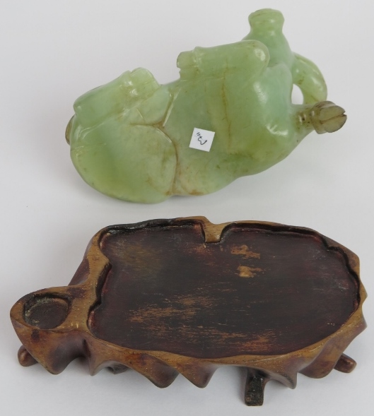 A Chinese carved celadon Jade recumbent water Buffalo, Ming style but likely Qing, resting on a - Image 4 of 4