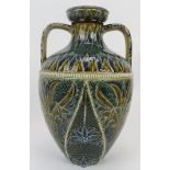 A Doulton Lambeth twin handled stoneware vase, dated 1878. Of Grecian urn form with an ovoid body,