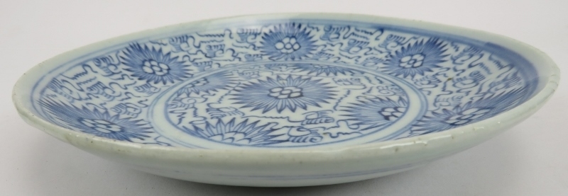 Two Chinese provincial blue and white porcelain dishes, 19th century. Both decorated in the same - Image 2 of 4