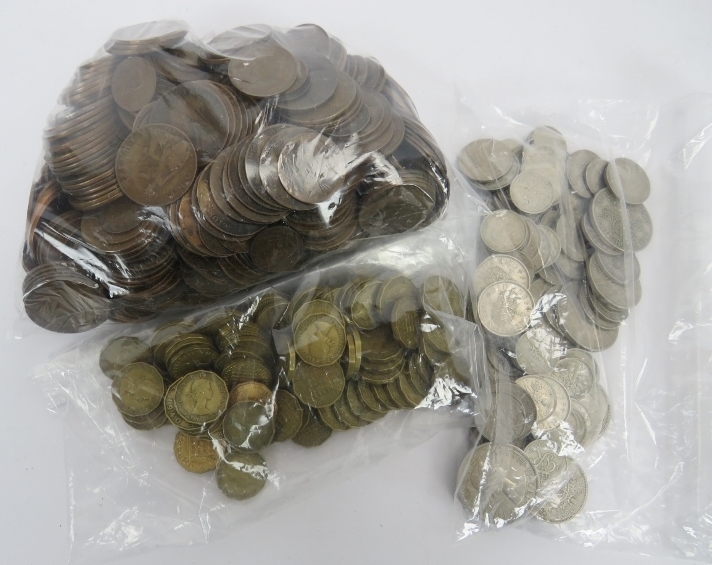 A large collection of British coins. Comprising a bag of old pennies and halfpennies, a bag of three