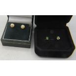 A pair of 14ct yellow gold and diamond stud earrings, marked Hel diamond. Approx: .05 each. Boxed. 2