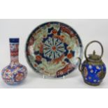A group of Chinese and Japanese Imari, late 19th/20th century. Comprising a plate, vase of of bottle