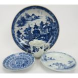 Four Chinese blue and white porcelain items, 19th century. Comprising three dishes and a cup. 8.3 in