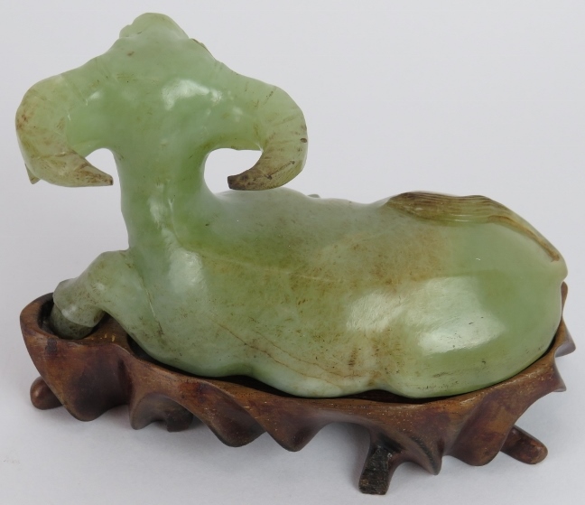 A Chinese carved celadon Jade recumbent water Buffalo, Ming style but likely Qing, resting on a - Image 3 of 4