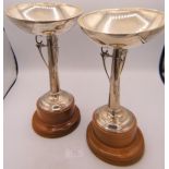 A good pair of silver Art Deco trophy's. Approx: 9" high without the stand. Engraved 'Clapton