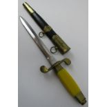 A vintage Soviet Naval officers dagger. 3NK, 52842. Engraved and plain brass mounts to leather