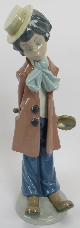 A Lladro porcelain figure 'Clown with Violin'. Model No 5057. 10.6 in (32 cm) height. Original box