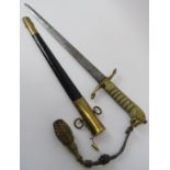 A George VI Royal Navy Midshipman's dirk and scabbard. Engraved blade with shagreen handle, lions