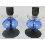 A matched pair of Boda glass and steel table candlesticks designed by Erik Hoglund, 20th century.