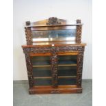 A good quality Victorian rosewood mirror-back chiffonier featuring barley-twist uprights and an