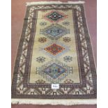 A 20th century Eastern design wool rug. 210cm x 124cm. Condition report: In very good condition.