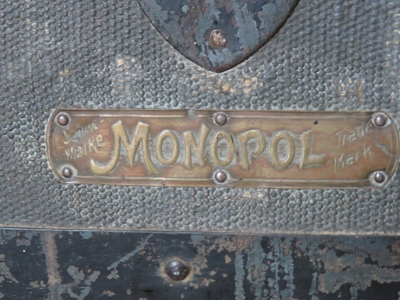 A large antique dome topped metal bound travelling trunk by Moritz Madler of Leipzig, on small brass - Image 5 of 5