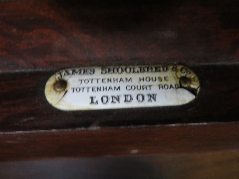 An Arts & Crafts walnut settle by James Shoolbred, with turned ball finials, carved frieze and - Image 2 of 4