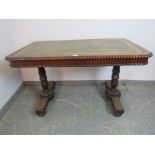 A William IV rosewood library table, with gadrooned edging and inset gilt tooled green leather