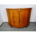 A fine quality Sheraton Revival satinwood demilune sideboard in the manner of Ince & Mayhew, the