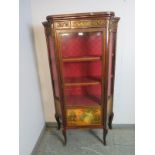 A vintage mahogany vitrine in the manner of Vernis Martin with ormolu mounts and red marble top, the