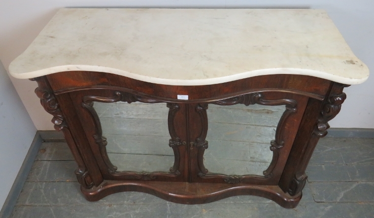 A Victorian rosewood serpentine fronted chiffonier with marble top and carved corbels, flanking - Image 3 of 4