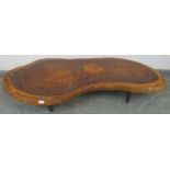 A naturalistic hardwood low coffee table, on hairpin legs. H24cm W147cm D68cm (approx). Condition