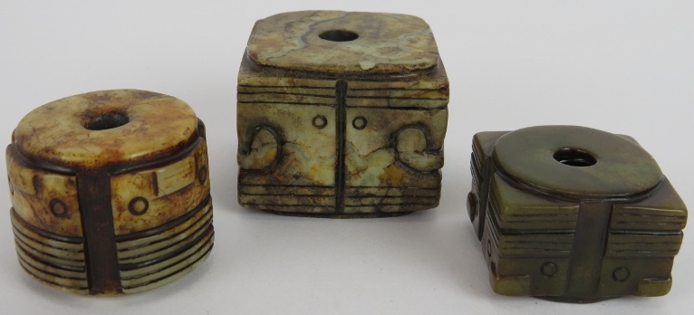 Three Chinese carved Jade Cong of Archaistic form but likely Qing, the celadon, russet and black