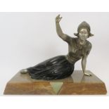 A French Art Deco polychrome decorated spelter figure of a Dutch female. Mounted on a marble and