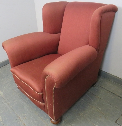 An Edwardian wingback club armchair, re-upholstered in light burgundy material with silver braided - Image 2 of 3