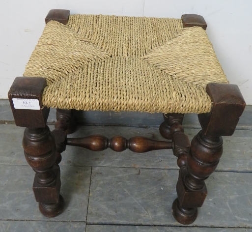 A small vintage oak stool with braided rope seat, on cup and cover supports united by a turned and - Image 3 of 3