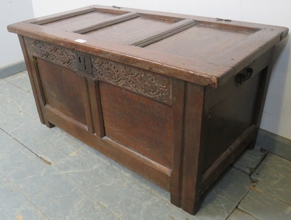 An early 18th century panelled oak coffer of small proportions, with internal candle box and - Image 2 of 4