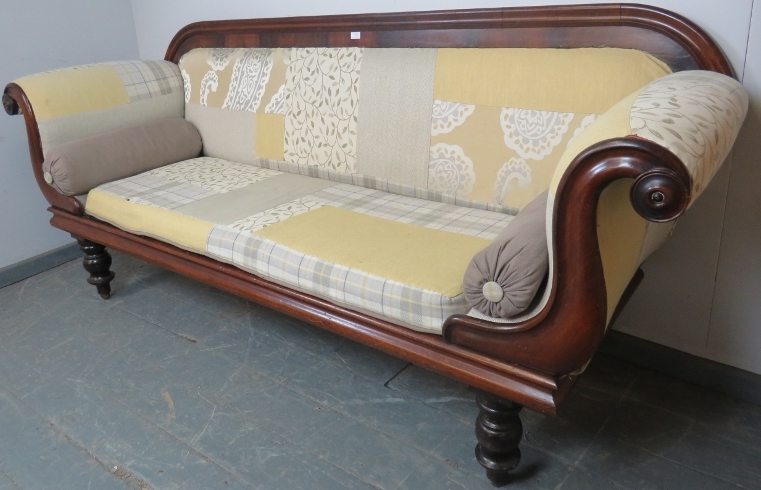 A Victorian mahogany show-wood sofa, with scrolled arms, reupholstered in contemporary patchwork - Image 2 of 3