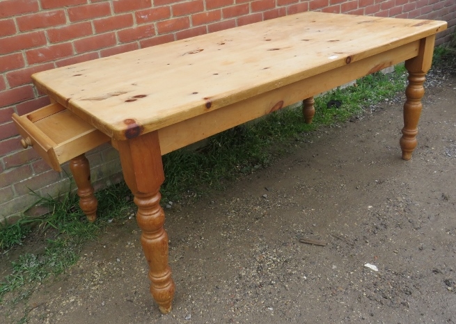 A Victorian style stripped pine kitchen table, on baluster turned tapering supports. H77cm W182cm - Image 2 of 2