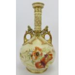 A large Royal Worcester twin handled vase. With a pierced cylindrical neck, gilt handles and