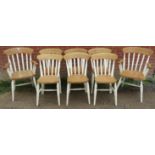 A set of eight (6+2) beech farmhouse kitchen chairs, on turned canted supports with an ‘H’