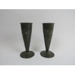 A pair of Liberty's English pewter Arts & Crafts posy flower holder vases by Archibald Knox. Both of