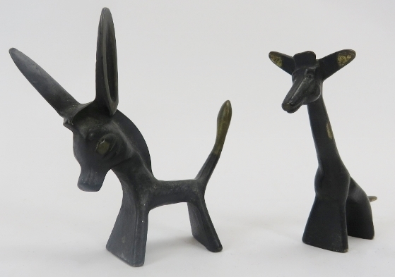 Two Walter Bosse cold painted brass figures, 20th century. Comprising a donkey and giraffe,