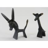 Two Walter Bosse cold painted brass figures, 20th century. Comprising a donkey and giraffe,