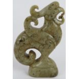 A Chinese carved celadon Jade Phoenix with black Jade speckles, Ming style but likely Qing, 7.5cm