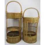 Two French hand woven wicker multi-tier picnic baskets. Both with compartmented lower sections. 34