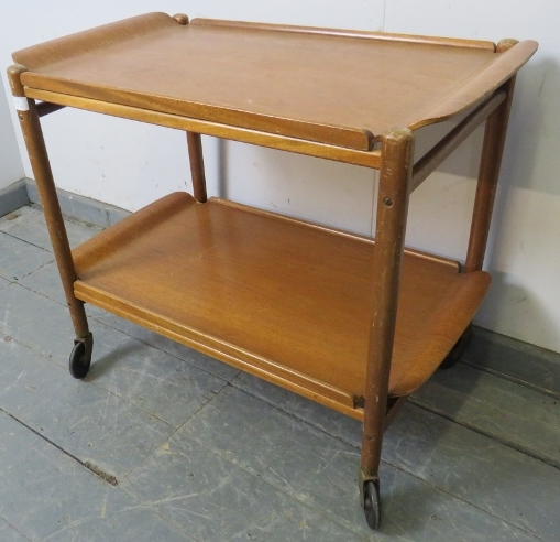 A mid-century teak two-tier drinks trolley, with two removable trays, on castors. H62cm W74cm - Image 2 of 3