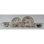 A group of Chinese cups and saucers, 18th/19th century. (7 items) Largest saucers: 5.3 in (13.5