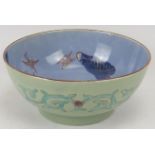 A Japanese Arita bowl, late Meiji/Taisho period. Unusually decorated with birds in a naturalistic