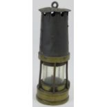 A brass miners lamp, 19th/early 20th century. 10 in (25.5 cm) height. Condition report: Wear with