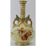 A large Royal Worcester twin handled vase. With a pierced cylindrical neck, gilt handles and