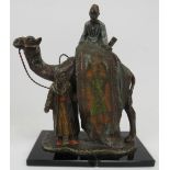 A novelty cold painted spelter desk top lighter. Modelled in Bergman style in the form of a camel