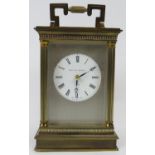 A good quality Matthew Norman of London brass striking carriage clock. Engine turned face with