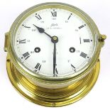 A Schatz Royal Mariner 8-day ship’s bulkhead clock. Brass case with black and white enamelled