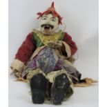 An Oriental marionette. Probably crafted in Thailand. 29 in (74 cm) approximate height. Condition
