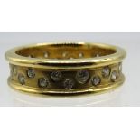 An 18ct yellow gold & diamond eternity ring with 30 small diamonds, approx 0.50cts, size M, boxed.