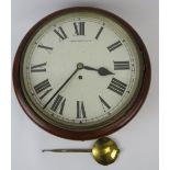 A London County Council wall clock, early 20th century. Of circular form with a mahogany case and