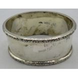 A plain oval silver napkin ring with chased edging, Birmingham 1970, approx weight 1.4 troy oz/43