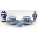A group of Chinese blue and white porcelain items, 19th century. Comprising a pair of teacups and