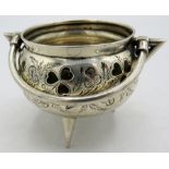 A silver salt in the shape of a cauldron inset with green enamelled shamrock leaves, Birmingham